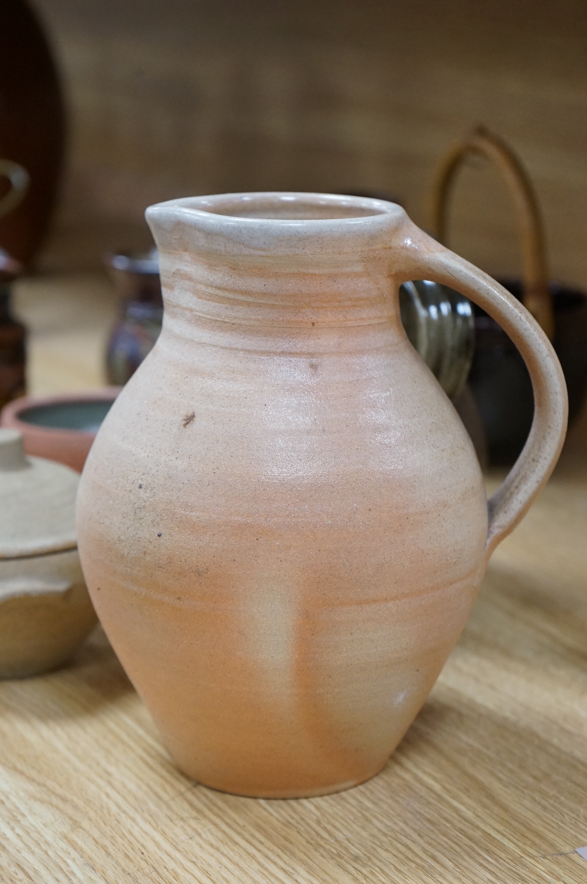 A large group of 20th century signed and unsigned Studio pottery, tallest 23cm high